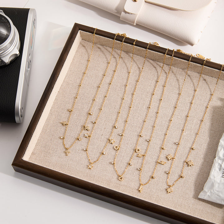 Zephyr Star Charm Station Necklace