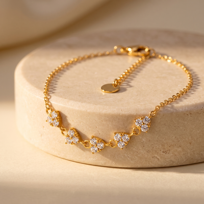 Mimosa Clover Trefoil Bracelet displayed on travertine