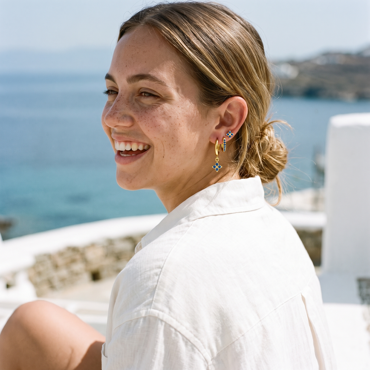 Myrtle Clover Stack Earrings in Blue worn by the model
