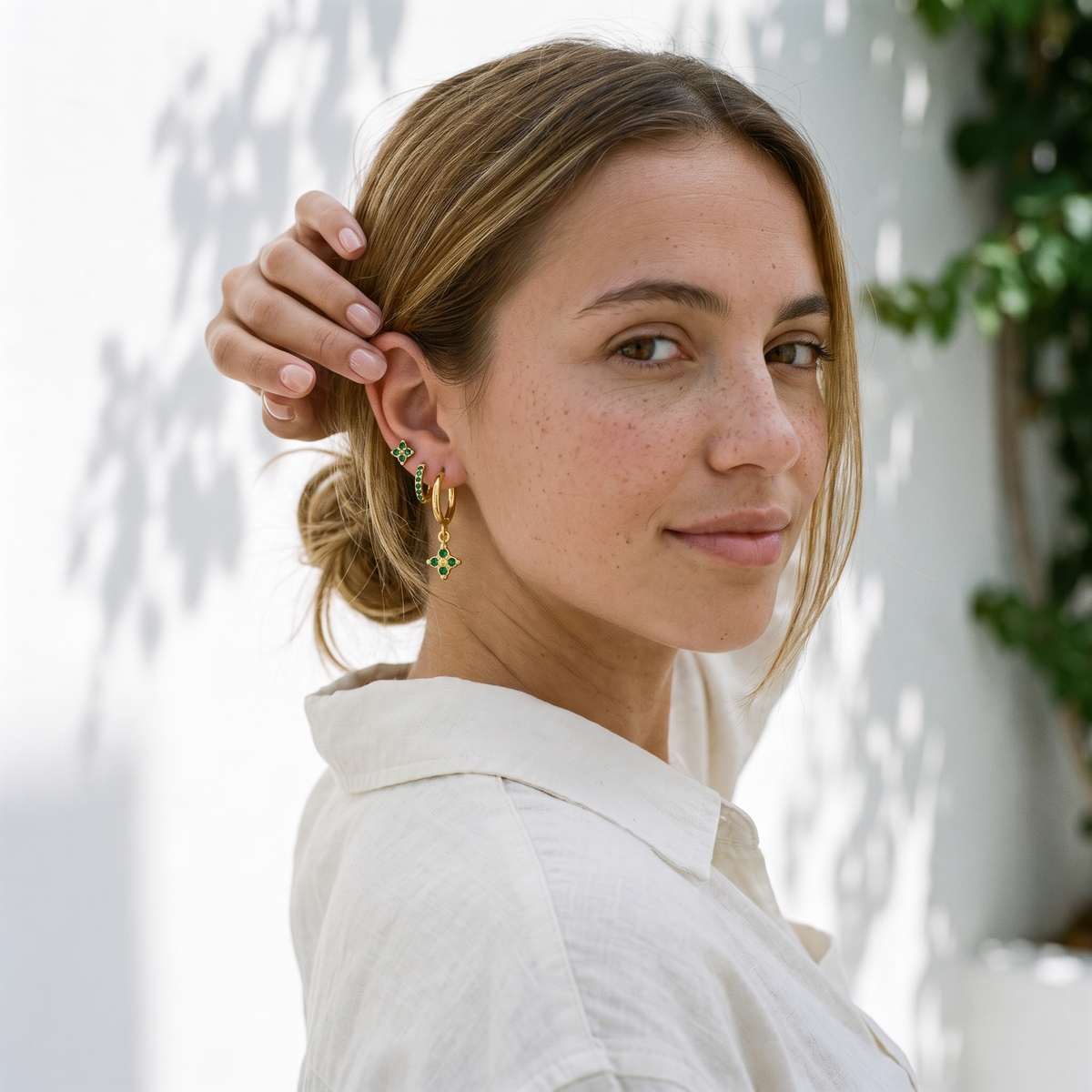 Myrtle Clover Stack Earrings in Green worn by the model