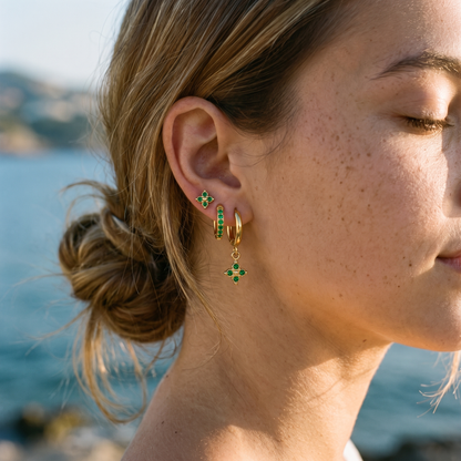 Myrtle Clover Stack Earrings in Green close-up on the ear